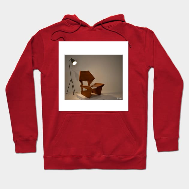 this design in a furniture chair in vintage minimalism art ecopop photograph Hoodie by jorge_lebeau